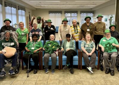 A group of participants wear their festive St. Patrick's Day attire